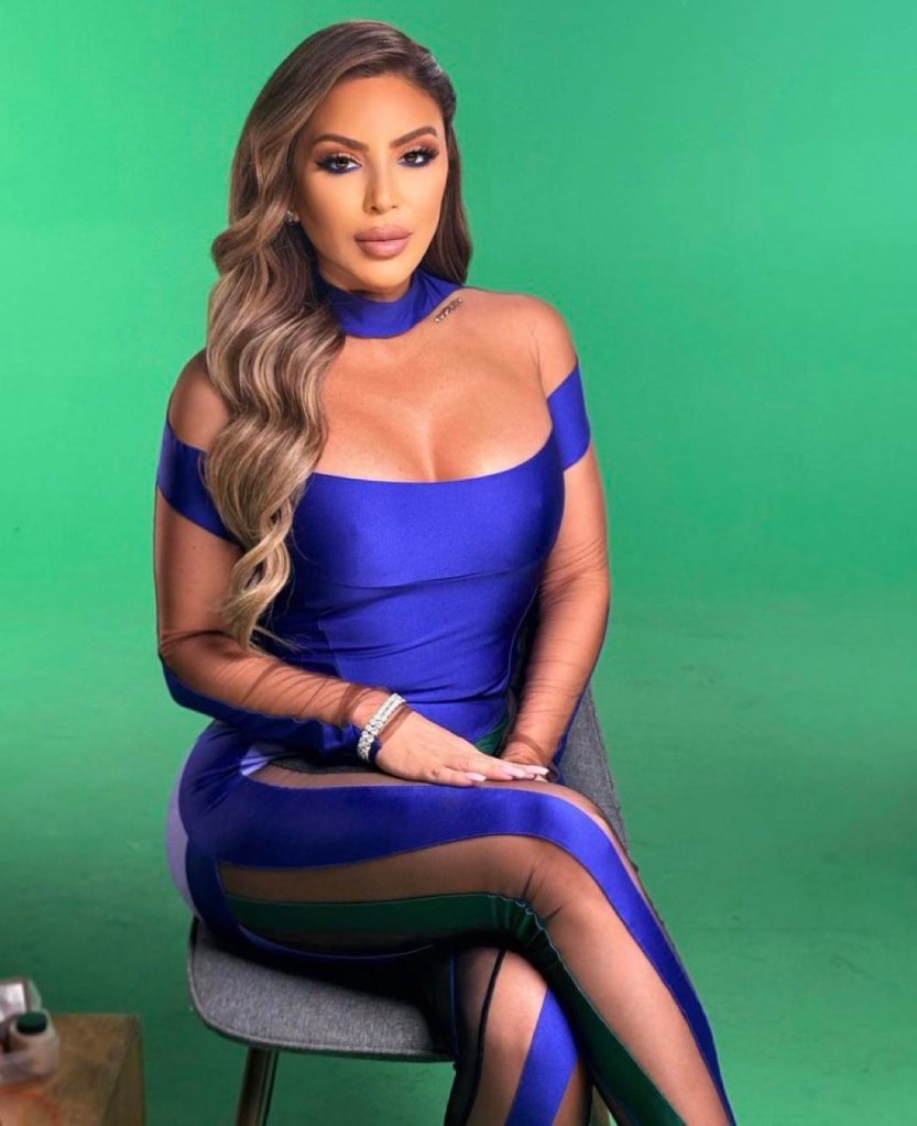 Larsa Pippen wears blue bodysuit with sheer side panels for confessional look.