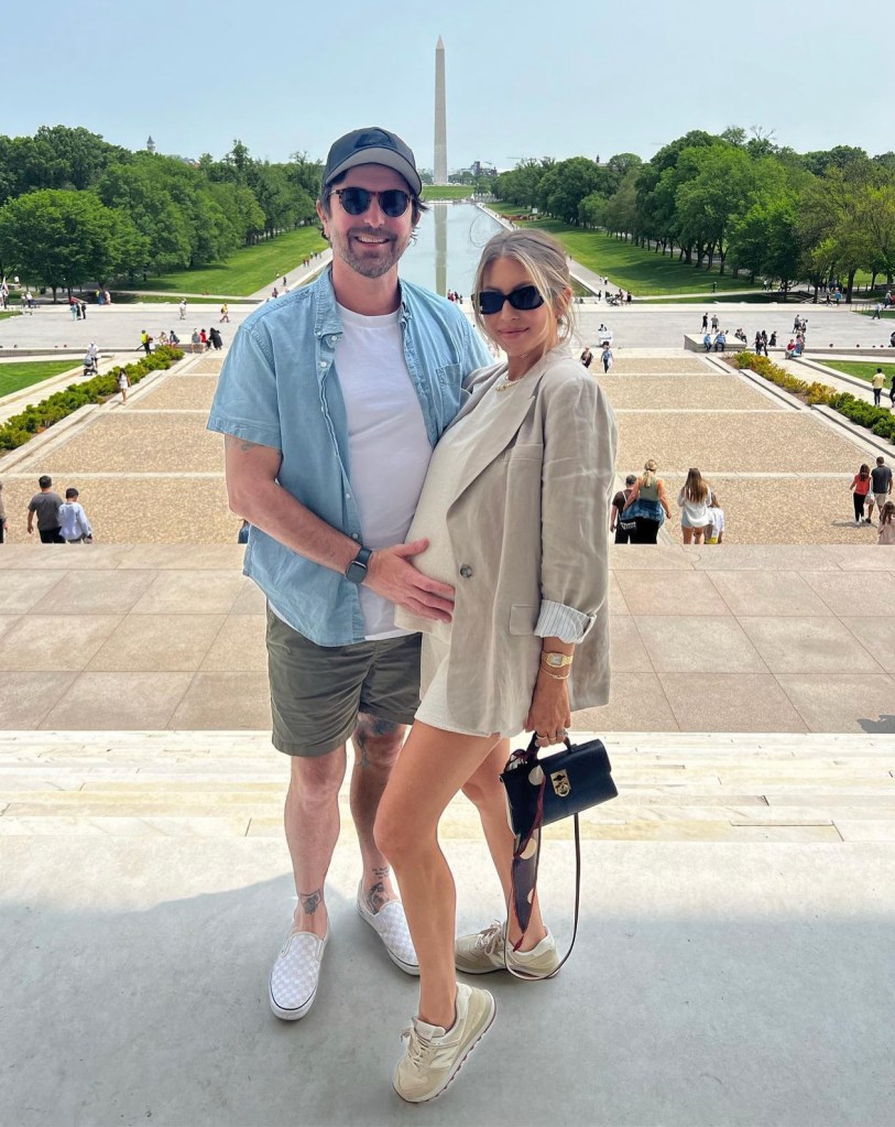 Vanderpump Rules alums Stassi Schroeder and Beau Clark pose for photo at National Mall in Washington D.C.