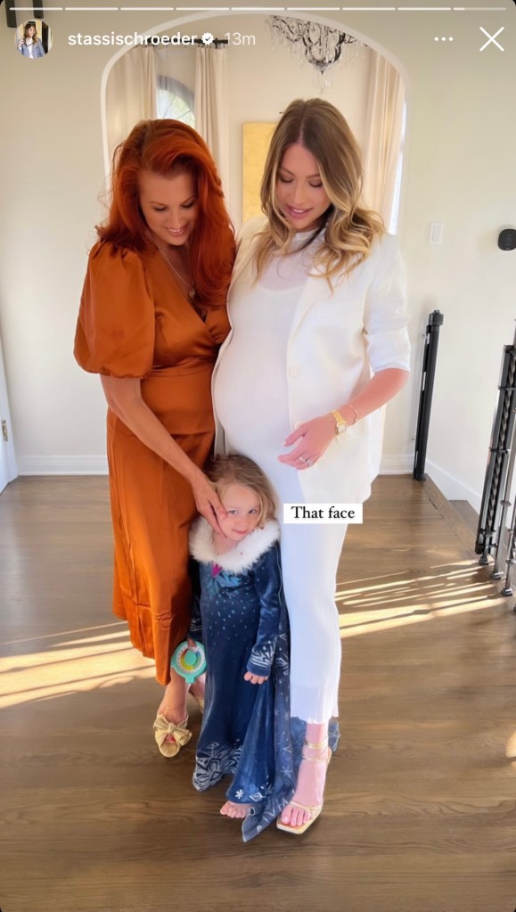 Stassi Schroeder poses with her mom Dayna and daughter Hartford on the day of her baby shower