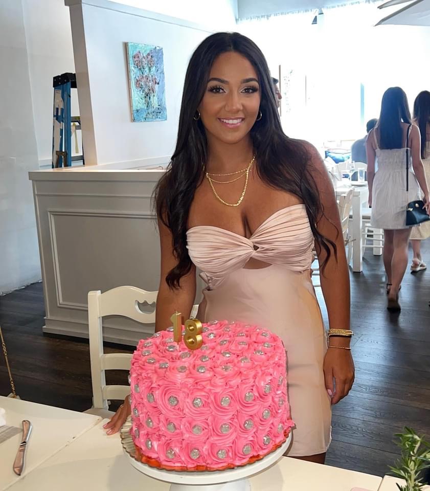 RHONJ's Antonia Gorga poses with her pink and silver birthday cake
