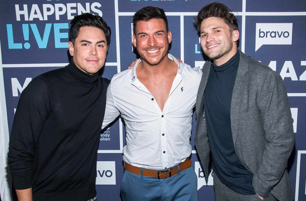 Tom Sandoval, Jax Taylor, and Tom Schwartz pose for photo in front of step and repeat after appearing on Bravo's Watch What Happens Live With Andy Cohen