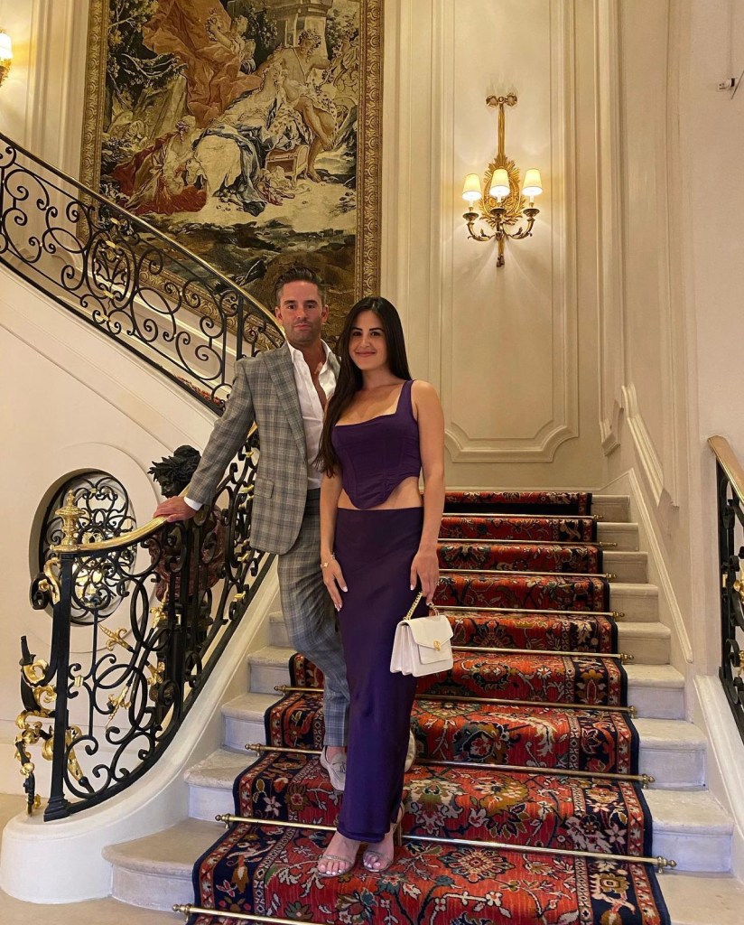 Luxury Real Estate agents, Michelle Lally and Jesse Lally, who own The Beverly Hills Estates agency, pose for photo on the stair case at the Ritz Hotel in Paris, France.